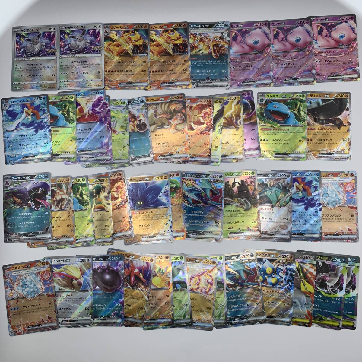 ポケモンカード 47枚 傷・ダメージ有 / かがやくイーブイ HP90 055/071K　リザードンex HP330 066/108RR 00/165RR　ミュウex 他 かぶりあり